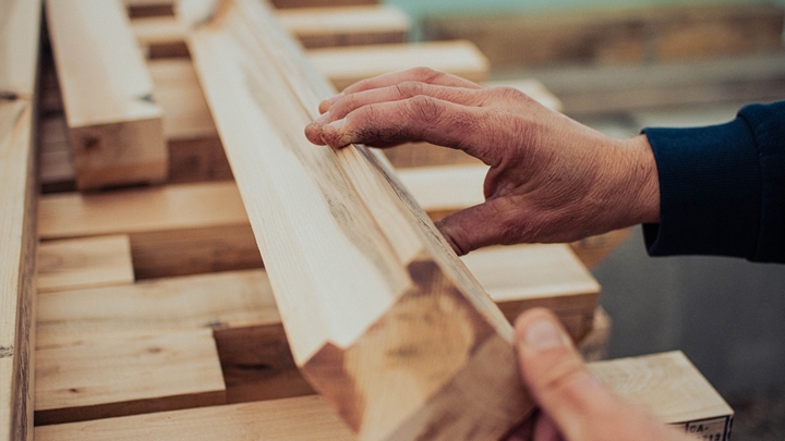 Hand holding wooden blocks