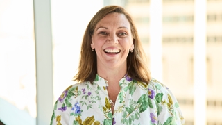Portrait shot of Angela, Senior Manager of Change at Rio posing for camera