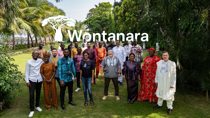 A group of people assembled and posing for the camera in a garden in Wontanara.