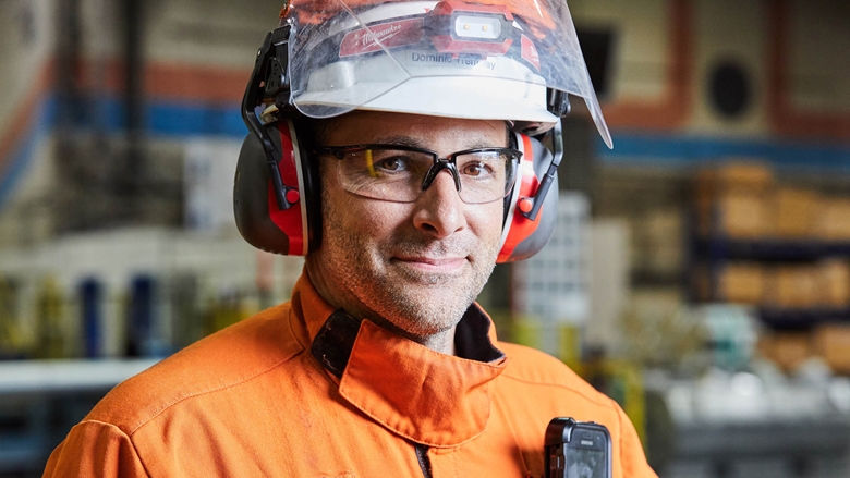 Employee smiling at camera