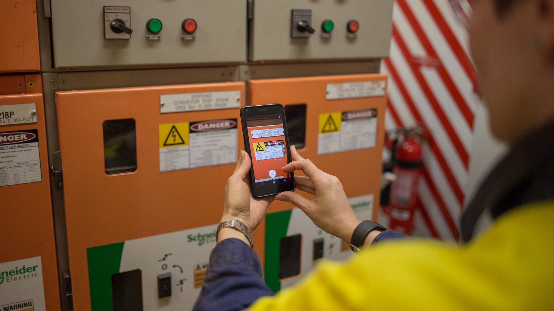 Employee using Critical Risk Management application at Parker Point Port, Dampier
