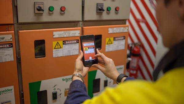 Employee using Critical Risk Management application at Parker Point Port, Dampier